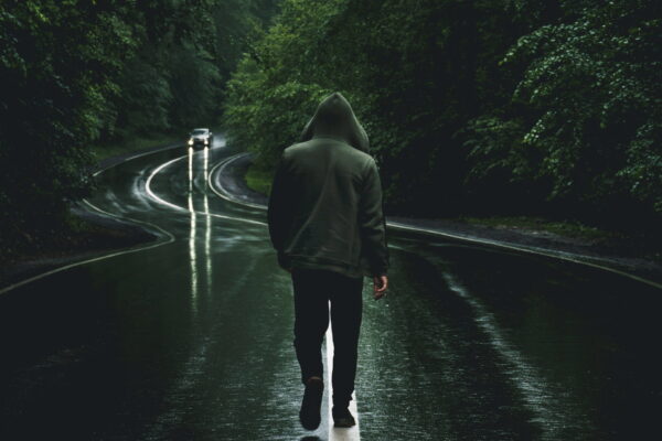 A man walking on the road