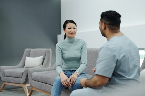 A doctor and a patient sitting